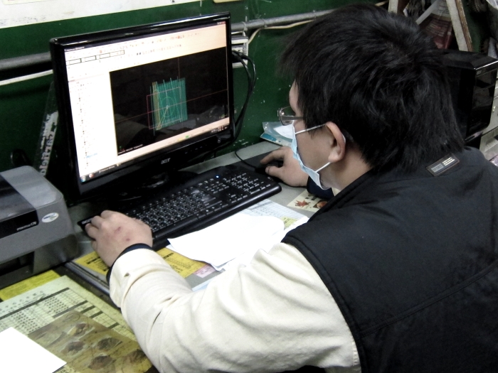 NC programming by using CAM software in CNC machined shop.