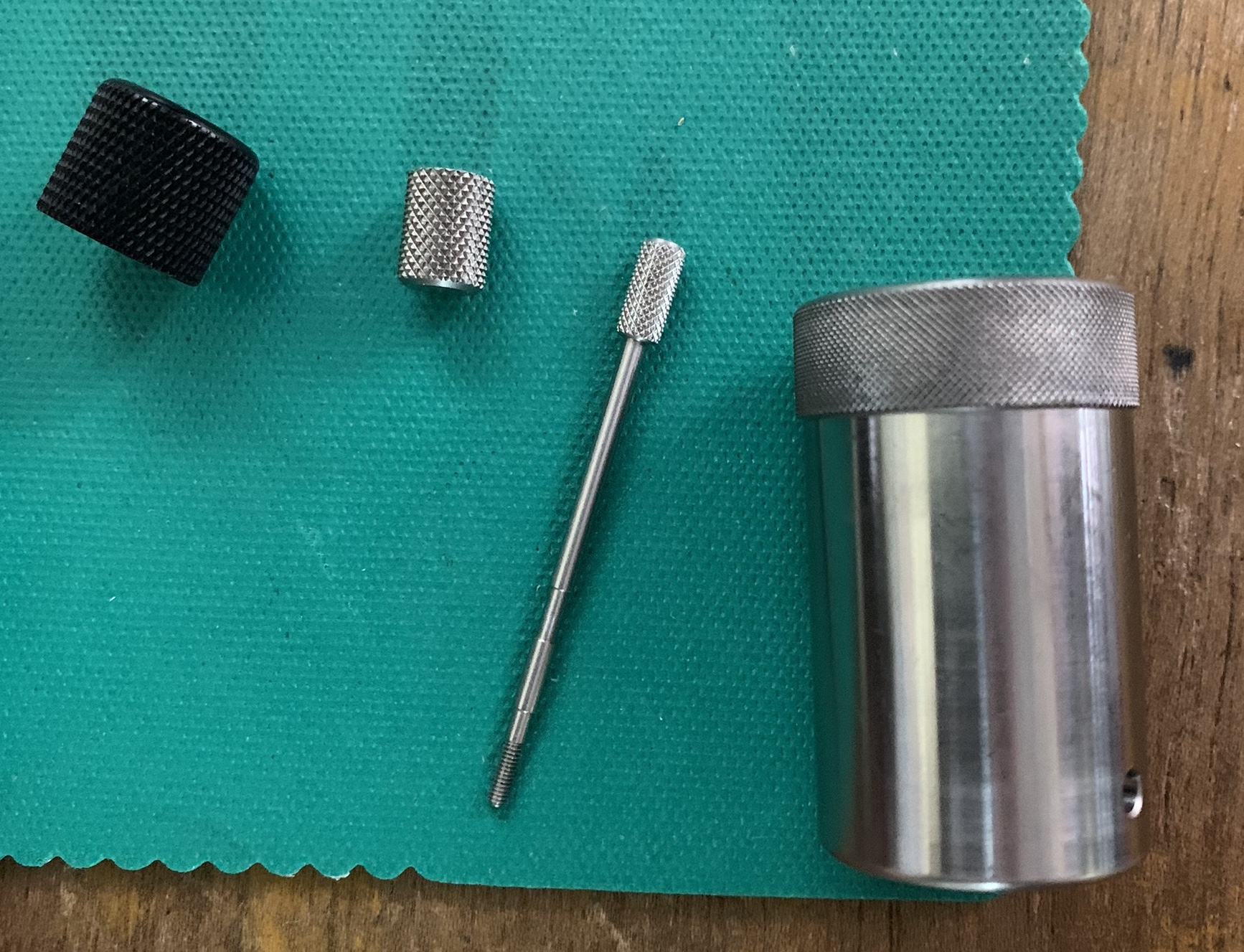Knurling pitch comparison to enhance adhesive bonding